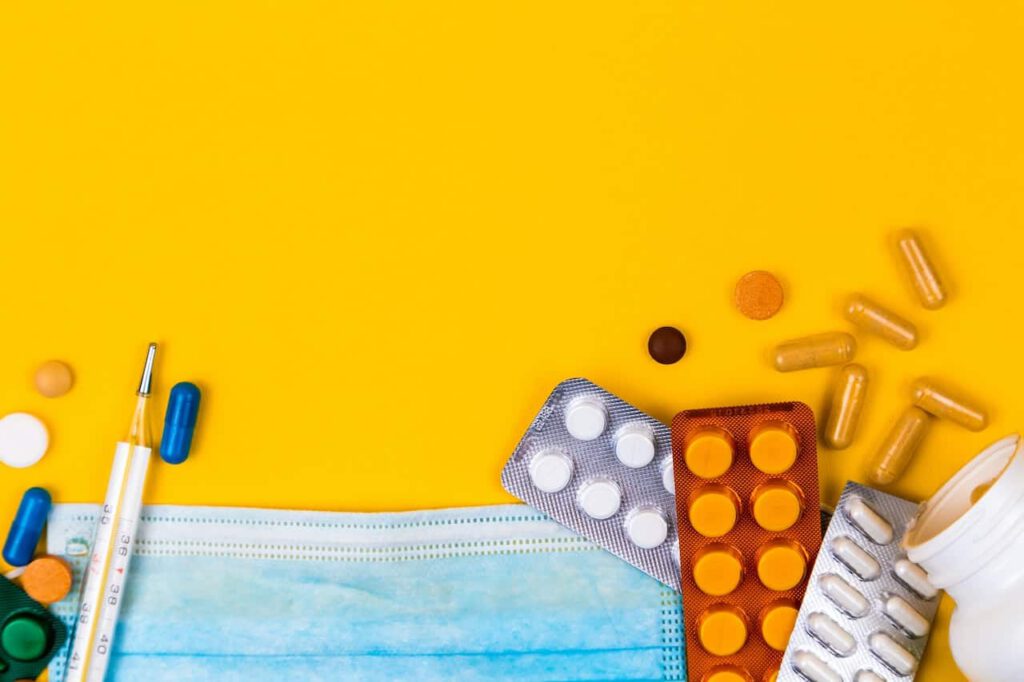 pills on yellow background