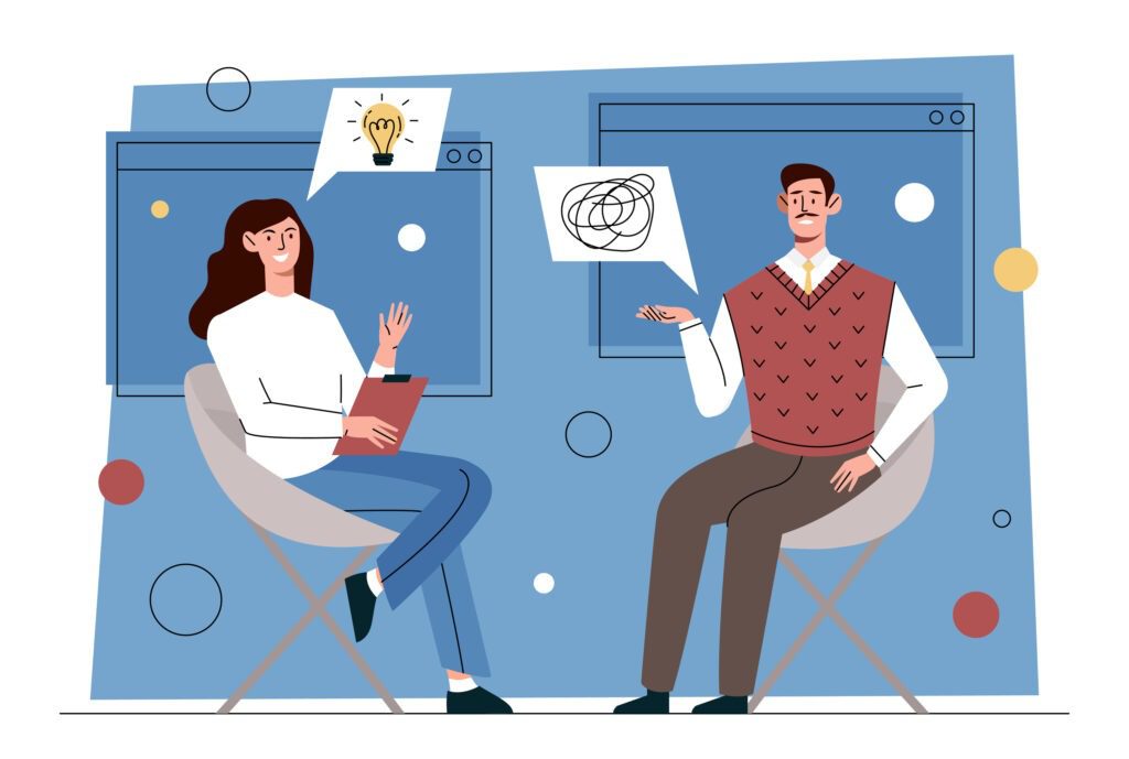 Two people sitting discussing psychological therapy